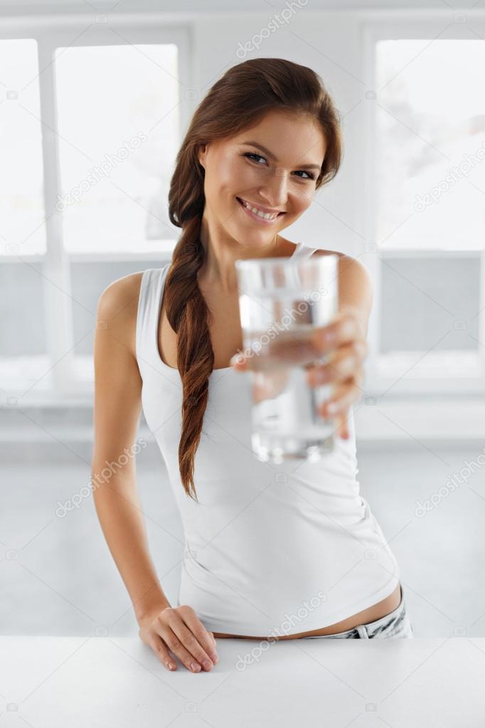 Diet Concept. Happy Healthy Woman With Glass Of Water. Drinks. L