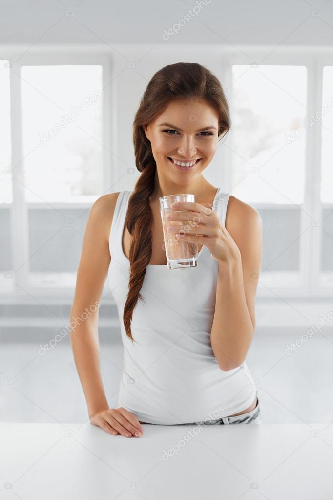 Diet Concept. Happy Healthy Woman With Glass Of Water. Drinks. L