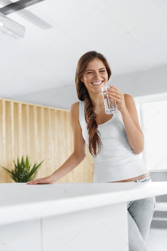 Drink Water. Happy Smiling Woman Drinking Water. Healthy Lifesty
