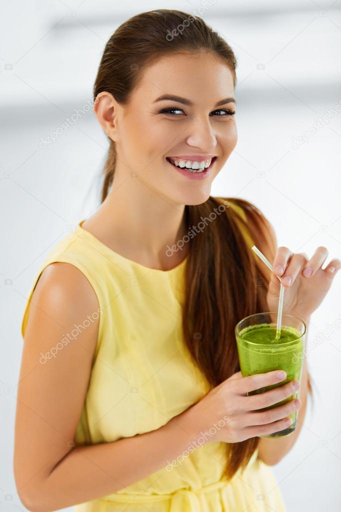 Healthy Diet. Woman Drinking Green Detox Juice. Lifestyle. Nutrition Drinks
