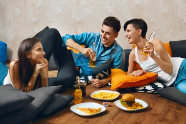 Eating Food. Group Of Friends Eating Fast Food, Drinking Soda