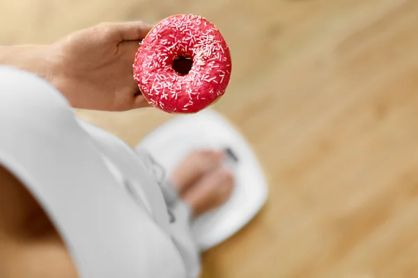 Diet Concept. Woman On Scale Holding Donut. Weight Loss. Dieting — ストック写真
