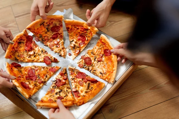 Eating Pizza. Group Of Friends Sharing Pizza. Fast Food, Leisure