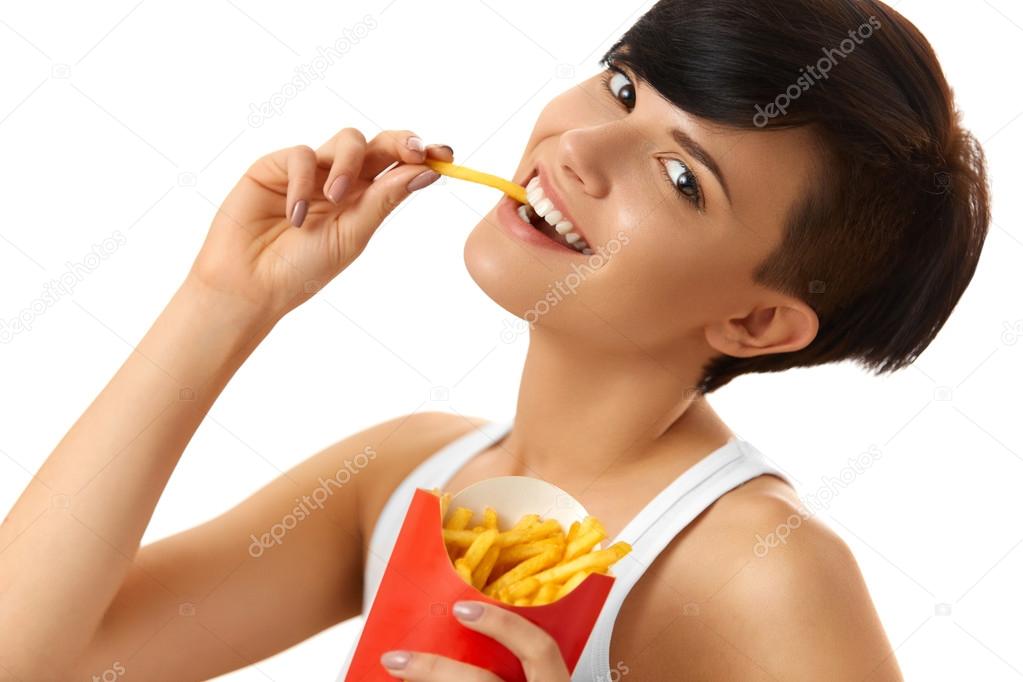 Eating Food. Woman Holding French Fries. White Background. Fast 