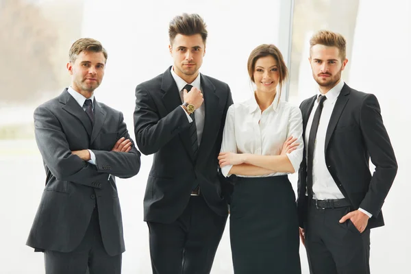 Business Team. Happy smiling people standing in a row at office — Stock Photo, Image