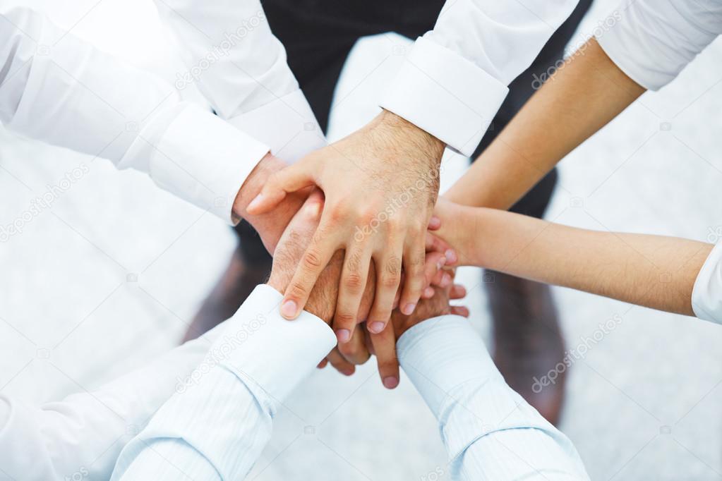 International business team showing unity with their hands toget Stock Photo by ©puhhha 91576828 International business team showing unity with their hands toget Stock Photo by ©puhhha 91576828