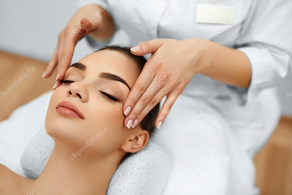 Skin, Body Care. Woman Getting Beauty Spa Face Massage. Treatmen