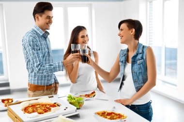 Happy Friends Having Dinner Party Home. Eating Food, Friendship.