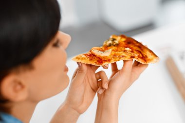 Eating Fast Food. Woman Eating Italian Pizza. Nutrition. Diet, L