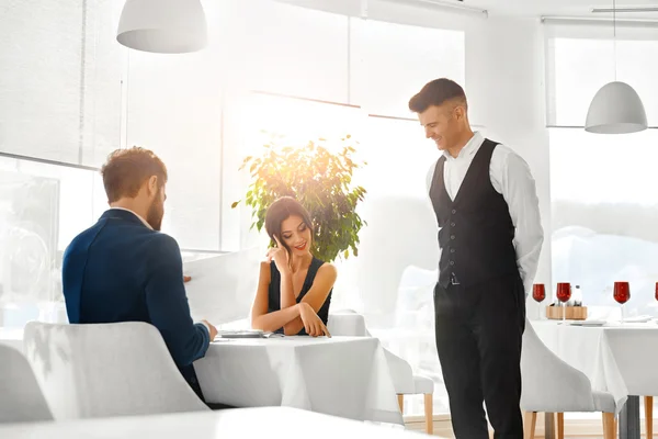 Romantic Dinner. Happy Couple In Love Ordering Food In Restauran — Stockfoto