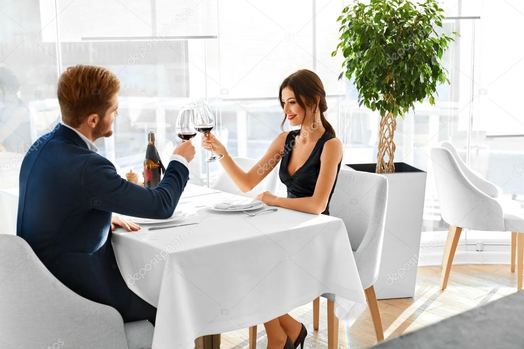 Celebration. Romantic Couple In Love Cheering, Having Dinner. Re