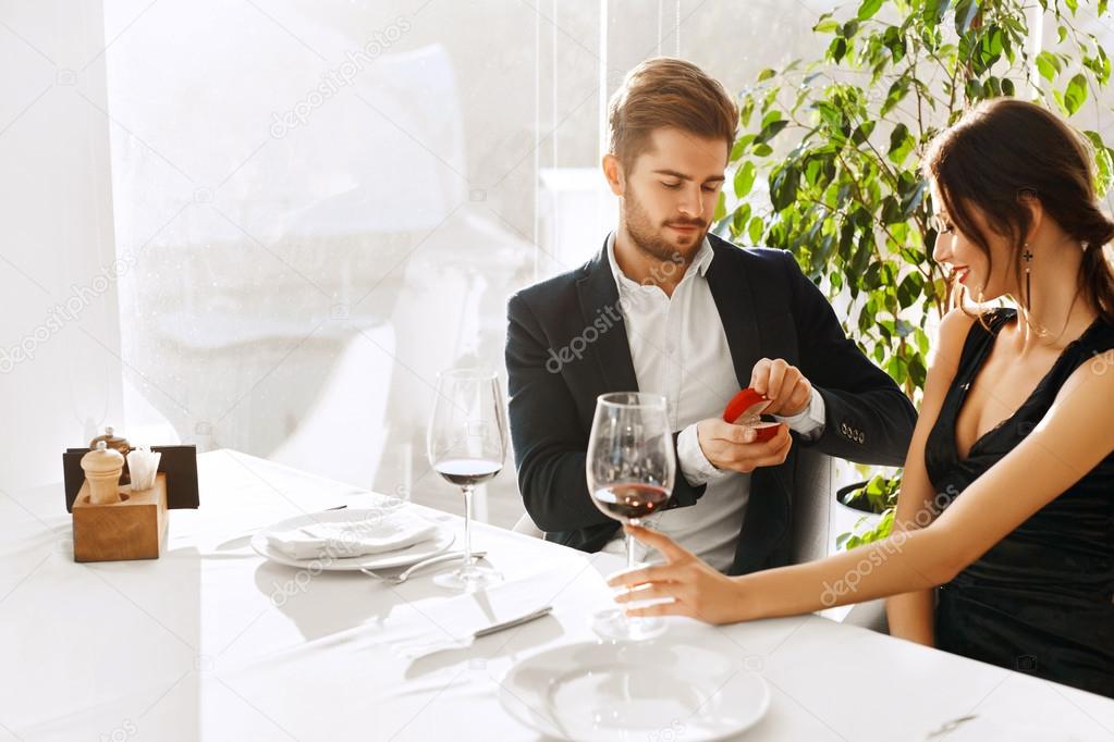 Love. Romantic Couple. Marriage Proposal In Restaurant. Wedding,