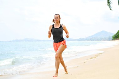 Sports. Athlete Jogging On Beach. Fitness, Exercising, Healthy L