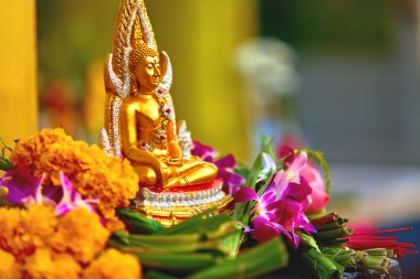Religion. Buddha Statue With Flowers At Temple, Thailand. Buddhi