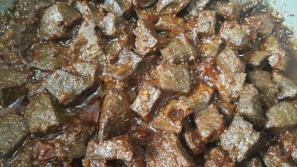 A close up view of Stewed chicken liver withspices  on it, a traditional home made delicious liver dish