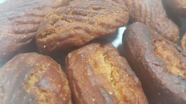 Khajoor 'un Pakistan ve Afganistan' da yaptığı geleneksel tatlı fırınının yakın görüntüsü. Khajoor fırın tatlısının yemek geçmişi.