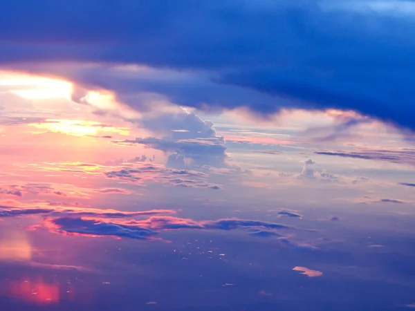 Sunset above clouds — Stock Photo, Image