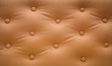 kahverengi deri döşeme kanepe