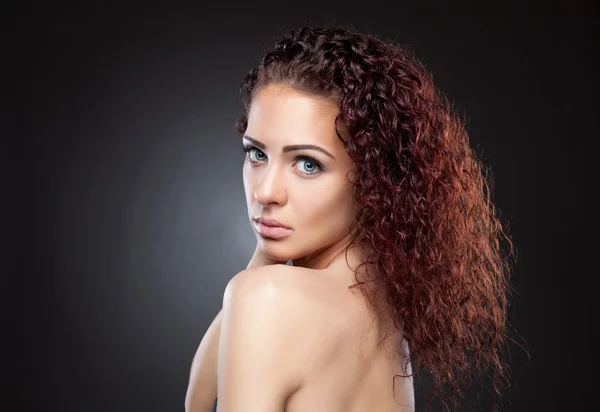 Beautiful  woman with red curly hair — Stock Photo, Image