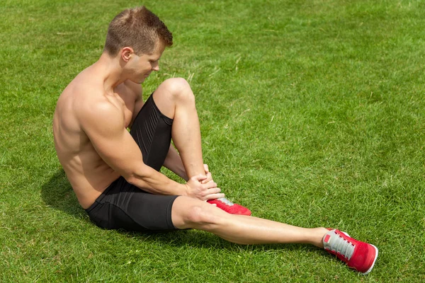 Lésion aux jambes pendant l'excercise — Photo