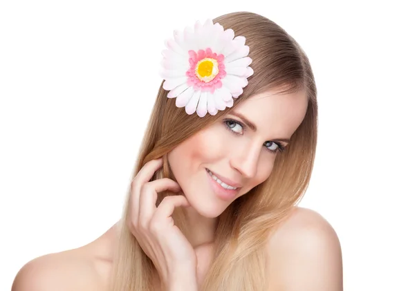 Beautiful woman with a flower in her hair Stock Image