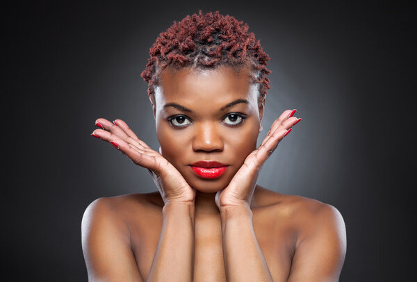 Black beauty with short spiky red hair