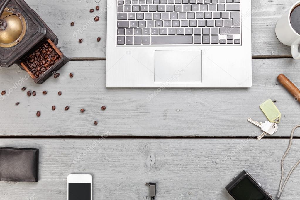 Workspace on a wooden table from above