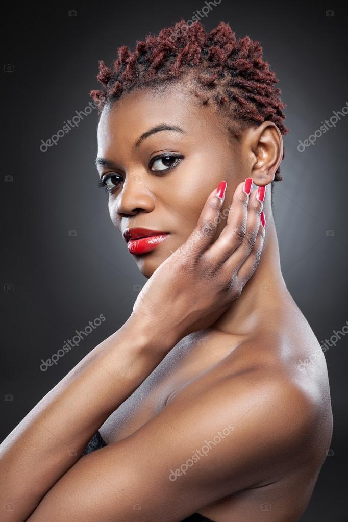 Black beauty with short spiky hair Stock Photo by ©tommyandone 94843032