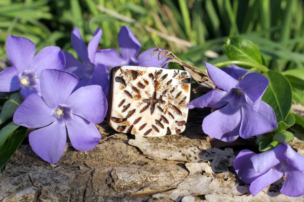 Handmade bone ethno ring on the nature background — Stock Photo, Image