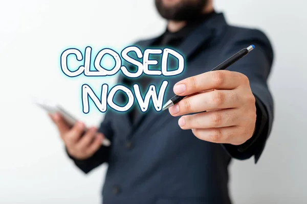 Text sign showing Closed Now. Conceptual photo of a business having ceased trading especially for a short period Model displaying different shots of holding pen ready for promotional use. — Stock Photo, Image