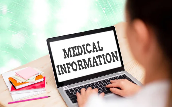 Handwriting text writing Medical Information. Concept meaning an individual demographic information and medical histories Modern gadgets with white display screen under colorful bokeh background.