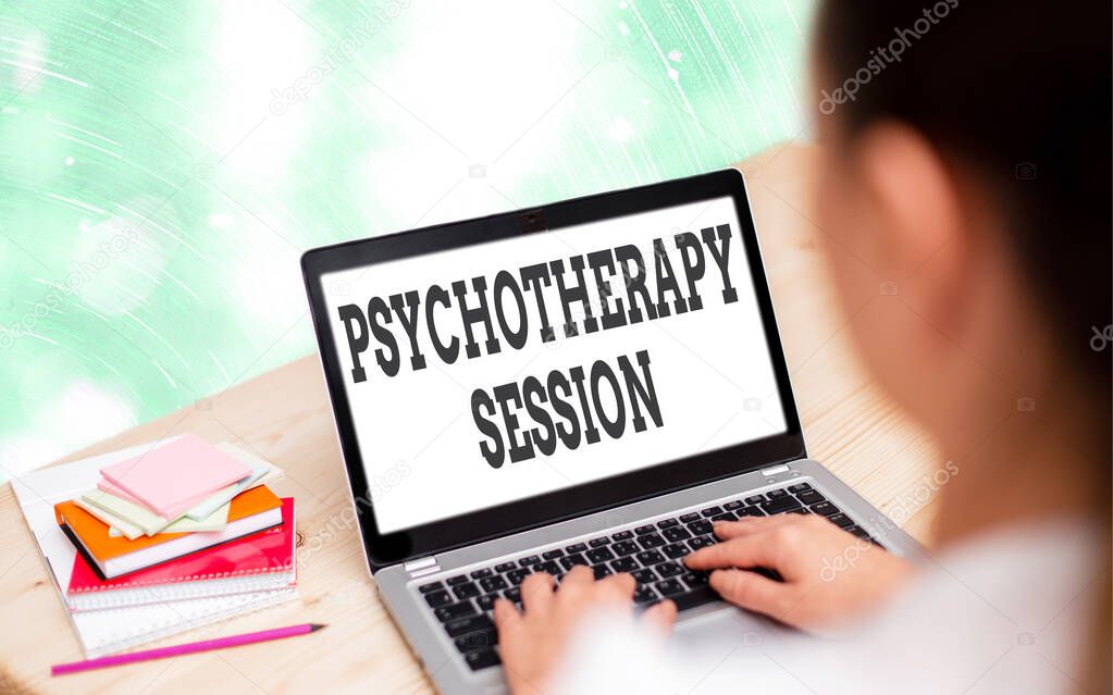 Handwriting text writing Psychotherapy Session. Concept meaning series of meetings in treating mental health problems Modern gadgets with white display screen under colorful bokeh background.