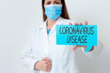 Coronavirüs Hastalığı belirtileri. Kavramsal fotoğraf, SARSCoV2 adlı virüsün Boş Çıkartma Kağıt Aksesuarları 'nı kullanan yeni bir laboratuvar teknisyeni tarafından hastalık olarak tanımlanıyor..