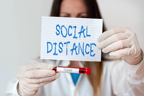 Text sign showing Social Distance. Conceptual photo maintaining a high interval physical distance for public health safety Laboratory blood test sample shown for medical diagnostic analysis result.