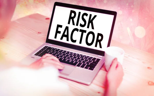 Text sign showing Risk Factor. Conceptual photo Characteristic that may increase the percentage of acquiring a disease Modern gadgets with white display screen under colorful bokeh background.