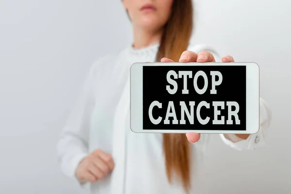 Conceptual hand writing showing Stop Cancer. Business photo showcasing prevent the uncontrolled growth of abnormal cells in the body Model displaying black screen modern smartphone mock-up. — Stock Photo, Image