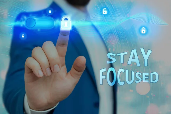 Handwriting text Stay Focused. Concept meaning Be attentive Concentrate Prioritize the task Avoid distractions Graphics padlock for web data information security application system. — Stock Photo, Image