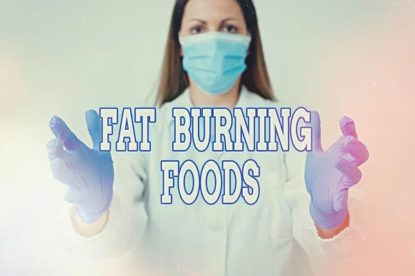 Sinal de texto mostrando Fat Burning Foods. Foto conceitual produzir perda de gordura, estimulando o metabolismo para reduzir o apetite Técnico de laboratório com acessórios de papel adesivo vazio smartphone. — Fotografia de Stock