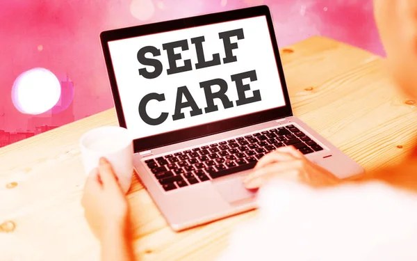 Word writing text Self Care. Business concept for the practice of taking action to preserve or improve one s is health Modern gadgets with white display screen under colorful bokeh background. — Stock Photo, Image