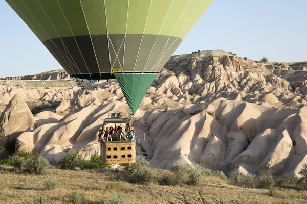 Hot air balloon flying over Cappadocia — Stock Photo, Image