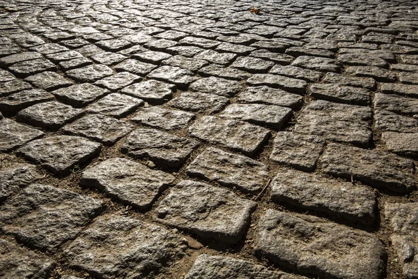 Macro viev of Cobblestone road — Stock Photo, Image