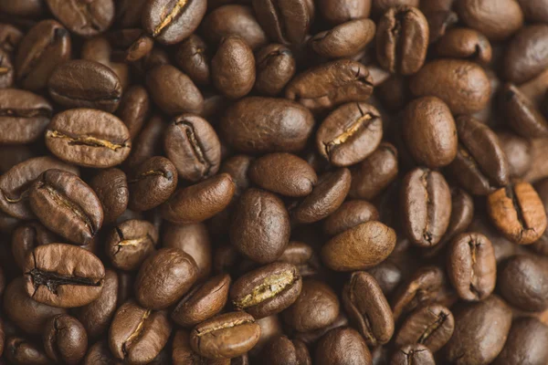 갈색 커피 콩, 배경과 텍스처에 대 한 매크로 커피 콩의 — 스톡 사진