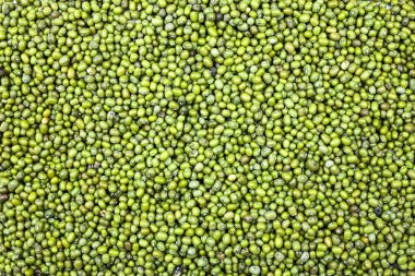 Arkaplanda fasulye yığını.