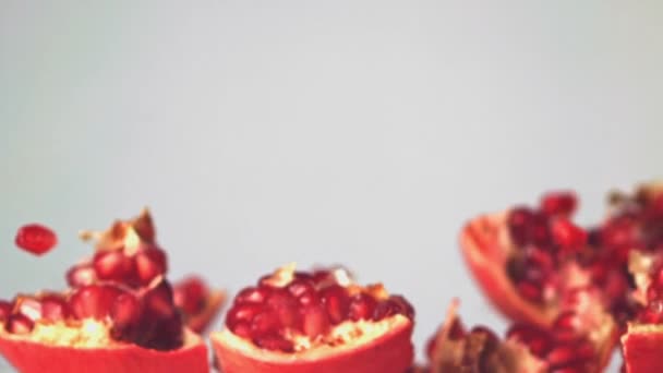Super slow motion pieces pomegranate and grains rise up. Filmed on a high-speed camera at 1000 fps. — Stock Video