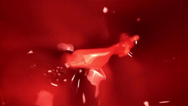 Super slow motion vers tomatensap. Macro achtergrond.Gefilmd met een high-speed camera op 1000 fps. — Stockvideo