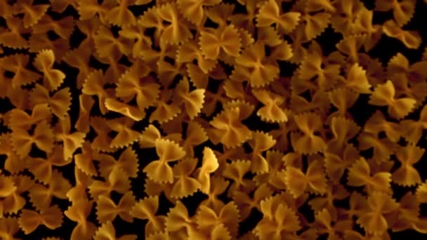 Super slow motion pasta farfalle droog. Gefilmd op een hoge snelheidscamera met 1000 fps. — Stockvideo