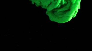 Siyah arkaplanda yeşil mürekkep var. 1000 fps 'de yüksek hızlı bir kamerayla çekildi. Yüksek kaliteli FullHD görüntüler