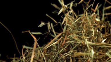 Saman uçar ve siyah bir arka plana düşer. 1000 fps 'de yüksek hızlı bir kamerayla çekildi. Yüksek kaliteli FullHD görüntüler