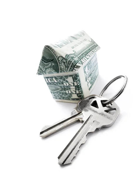 Geld huis sleutels — Stockfoto