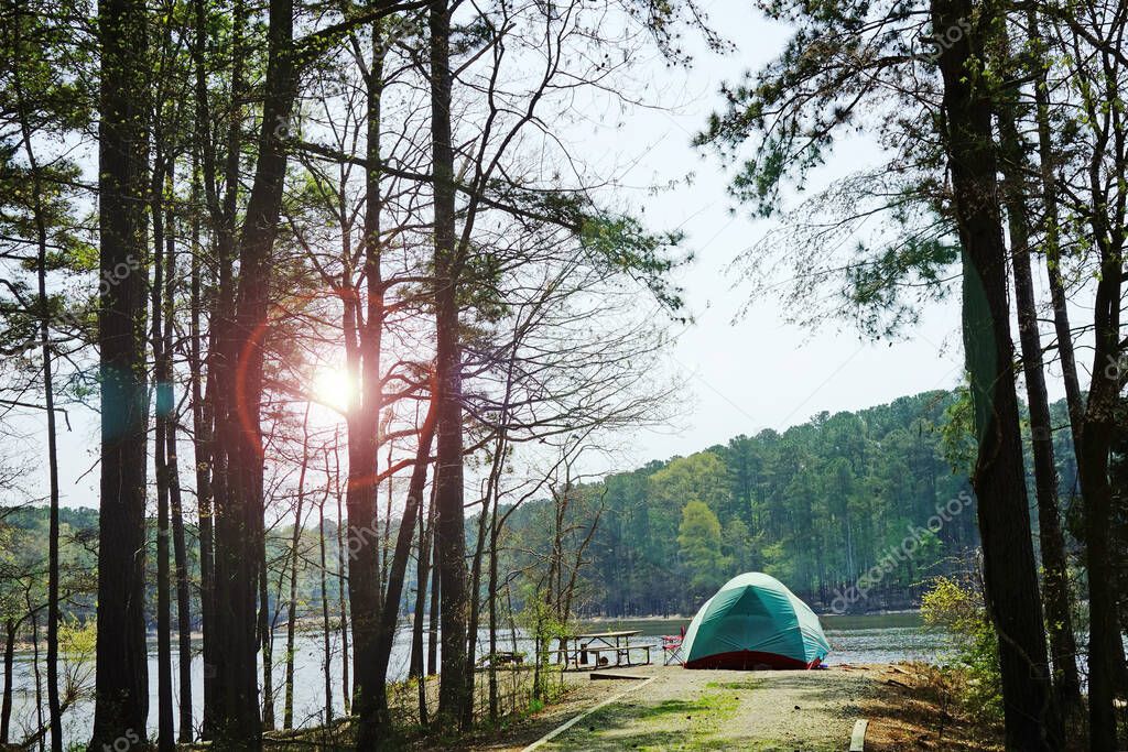 A tent at a waterfront campsite of Jordan Lake State Park  -- Poplar Point campground -- near Raleigh North Carolina